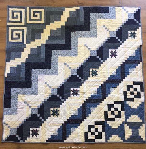 New very simple blue and white log cabin quilt top. Add a border, batting and backing and offers you got your self a quilt. The hard part is done